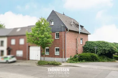 Gemütliche Raumaufteilung und liebevolle Gartengestaltung in Heinsberg-Schafhausen, 52525 Heinsberg-Schafhausen, Einfamilienhaus