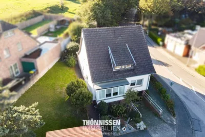 Solides Zweifamilienhaus mit großem Grundstück und flexiblem Nutzungskonzept in Heinsberg-Grebben - Ansicht (7577)