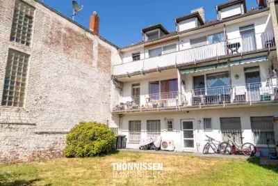 Wohn- und Geschäftshaus in zentraler Innenstadtlage von Übach-Palenberg - Rückansicht (5800)